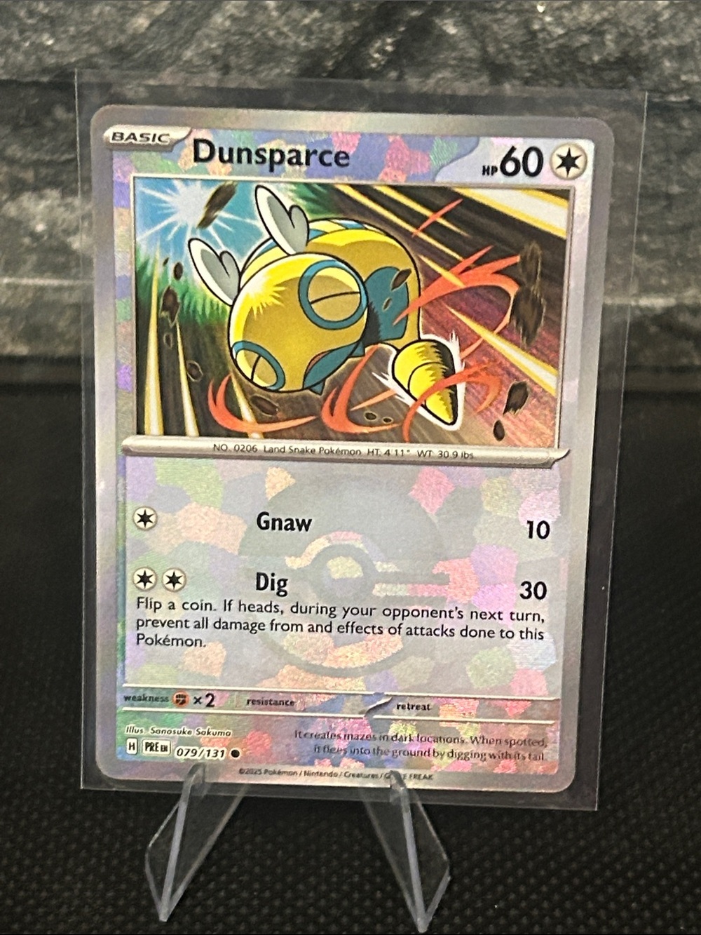 Pokemon Dunsparce‎ Pokeball 079/131 Holo from Prismatic Evolutions M/NM